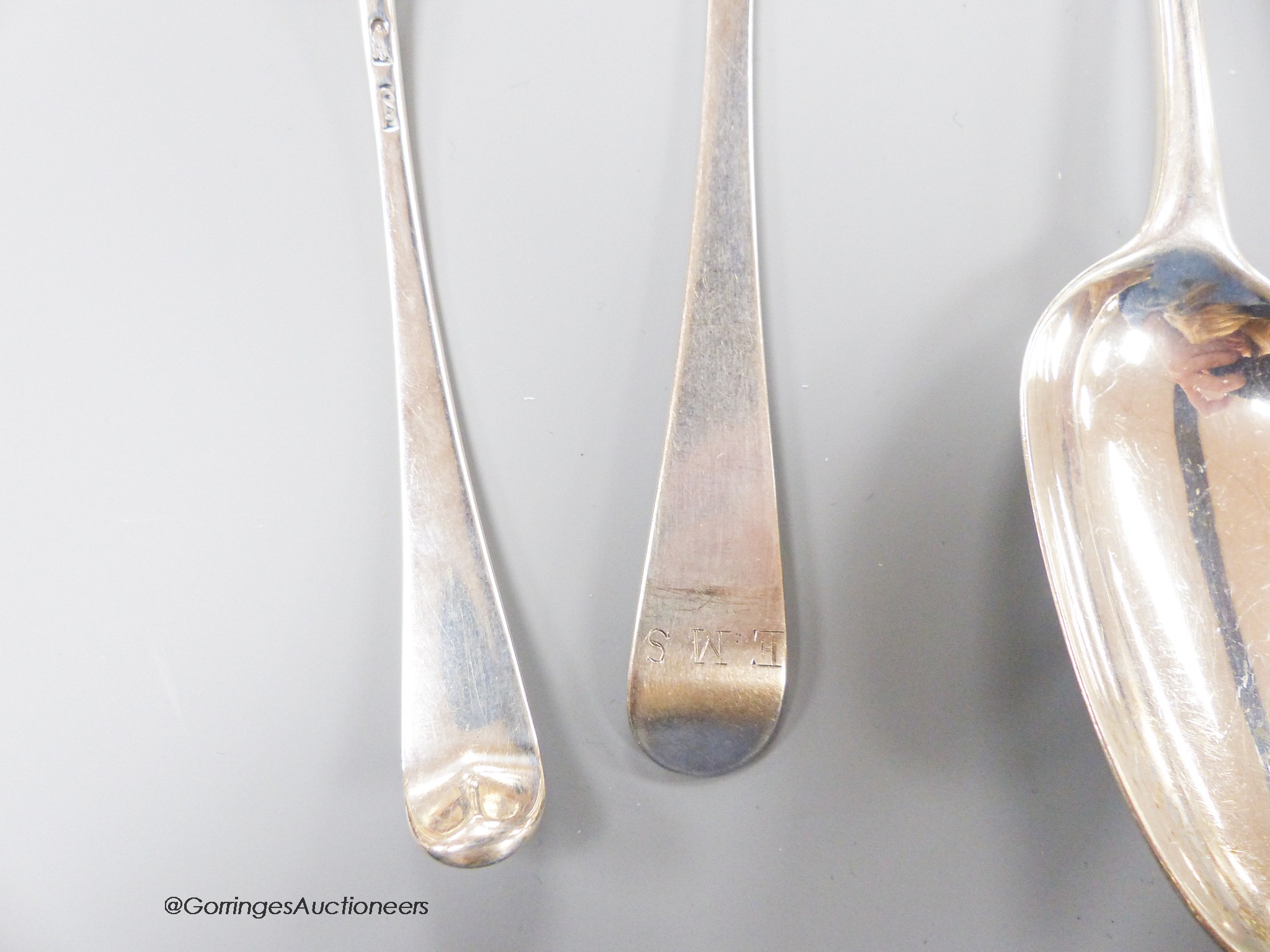 Ten assorted 18th century silver tablespoons and a similar sauce ladle, various pattern, dates and makers and six 19th century continental white metal tablespoons, gross 32.5oz.